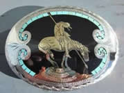 End of the Trail belt buckle